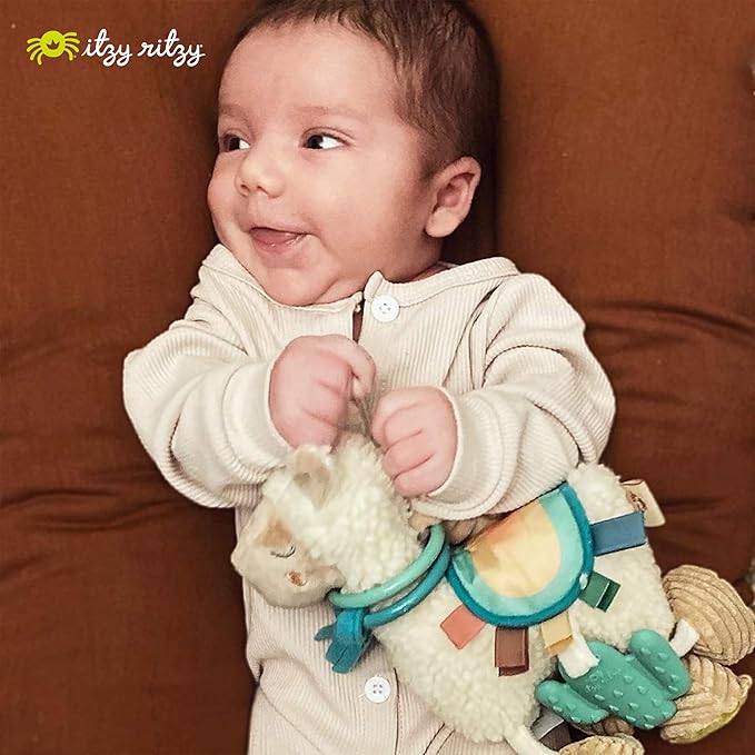 Itzy Ritzy Link & Love Toy for Stroller or Car Seat – Features Textured Ribbons, Crinkle Sounds, Clinking Rings & Silicone Teether – Designed For Ages 0 Months and Up (Llama)