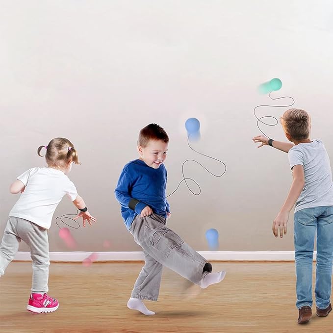 ArtCreativity Foam Return Balls Set of 4 – 2.25" Durable Rebound Balls with String, Assorted Colors, Fun Wrist Ball Toys for Kids, Party Favors, Carnival Prizes, Gifts for Boys & Girls, Indoor Play