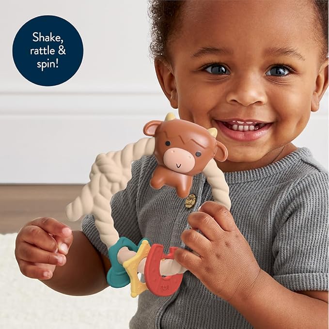 Itzy Ritzy Silicone Teether with Rattle – Rattle Teether Features Rattle Sound, Three Silicone Teething Rings and Raised Texture to Soothe Gums – Ages 3 Months and Up (Highland Cow)
