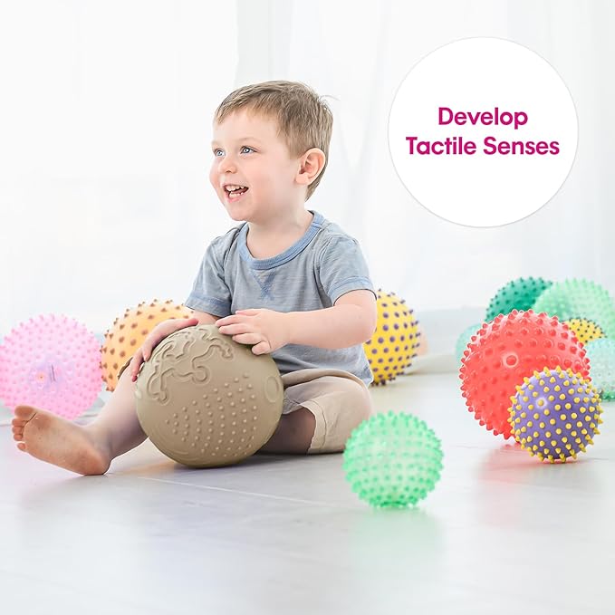 Edushape Texture-iffic Sensory Ball for Baby - 7" Baby Ball that Helps Enhance Gross Motor Skills for Kids - Toddler Ball with 8 Sections of Different Tactile Patterns