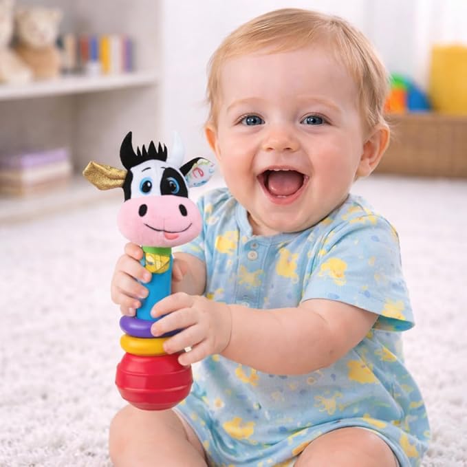 Balibazoo Clara The Cow Baby Rattle – Soft Plush Infant Stick Rattle Toy with Easy-Grip Handle, Golden Bell & Movable Hoops | Developmental Toy for Babies 0-18M