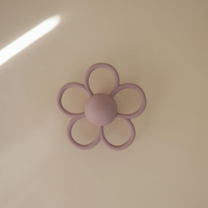 mushie Silicone Baby Daisy Rattle Teether Toy (Soft Lilac)