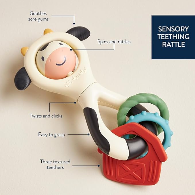 Itzy Ritzy Spinner Rattle Toy – Cow Design Sensory Teething Rattle Includes Spinning Face, Clicks, Rattles & Textured Teethers – Designed for Ages 3 Months and Up (Cow)