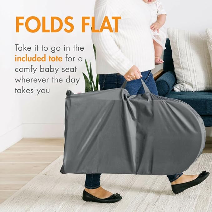 Boon Slant Portable Baby Bouncer - Folding Baby Seat for Infants - Lightweight Portable Baby Chair with Machine Washable Fabric and 3-Point Harness - Tan