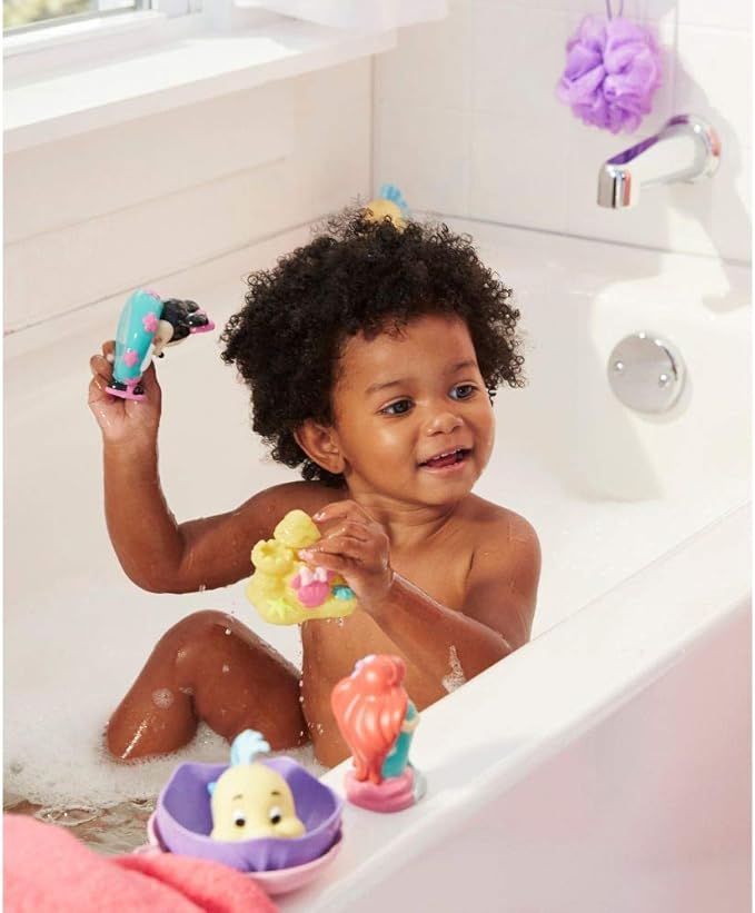 The First Years Disney Minnie Mouse Squirties Baby Bath Toys - Squishy Toddler Toys for Bath, Pool, and Everyday - 3 Count