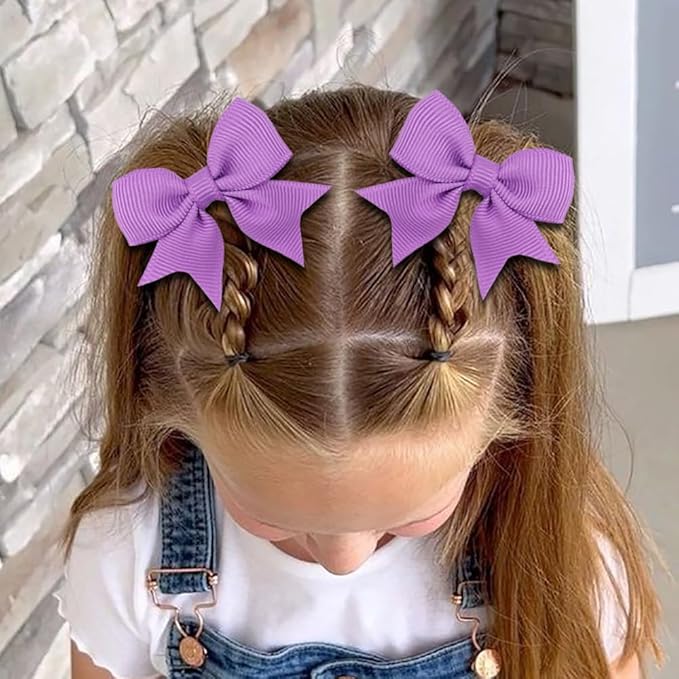 A set of two Cute Bow-shaped Elastic Hair Clips for Children. (light blue)