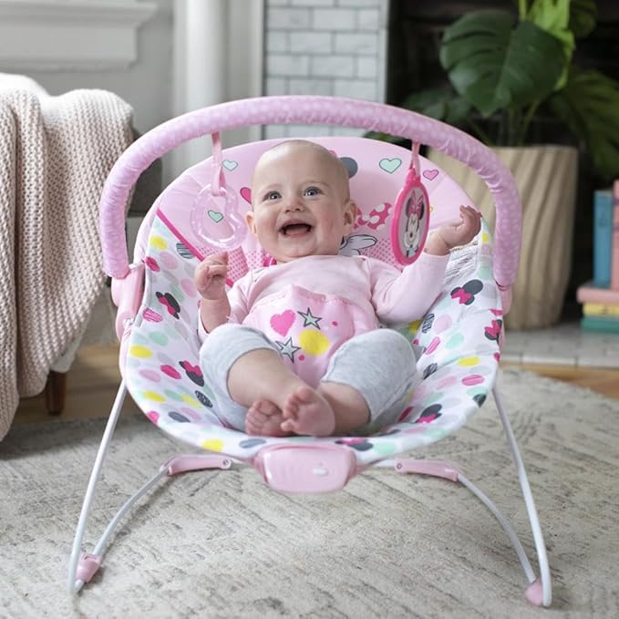 Bright Starts Disney Baby Minnie Mouse Baby Bouncer Soothing Vibrations Plush Infant Seat - Removable Toy Bar, Nonslip Feet, 0-6 Months Up to 20 lbs (Spotty Dotty)