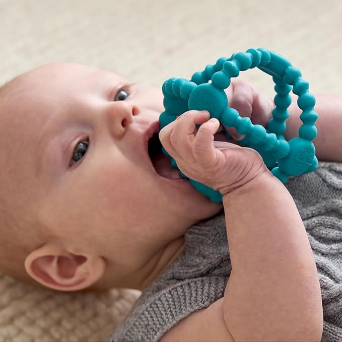 Itzy Ritzy Teething Ball – Flexible Teether Ball Soothes Sore Gums & Features Easy-to-Grip Design - Made of BPA-Free Silicone - Designed for Ages 3 Months and Up (Teal)