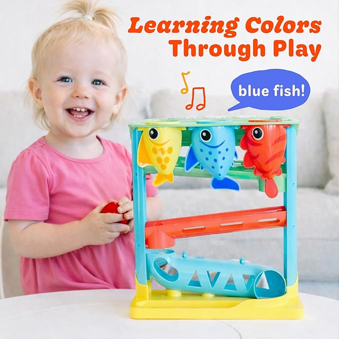 Move2Play, Feed The Fish | 30+ Fin-Tastic Songs & Phrases | Baby & Toddler Musical Toy | First Birthday Present for 1+ Year Old | Ages 6-24 Months | Boy & Girl Ball Drop Toy