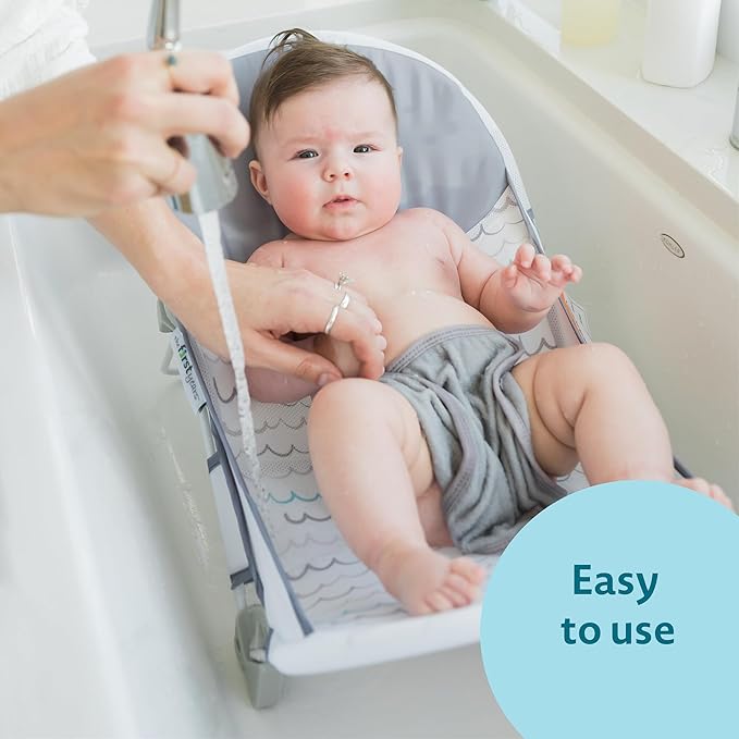 The First Years Sure Comfort Folding Baby Bather - Foldable Baby Bath Seat and Lounger for Home or On The Go - for Sink or Tub Use - Non-Slip Seat -for Up to 15 Lbs,(Pack of 4)