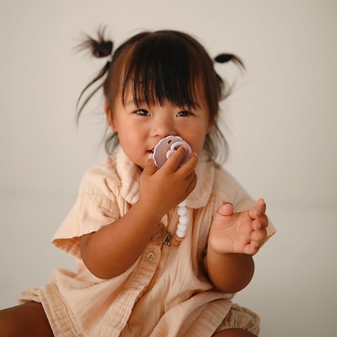FRIGG Daisy Natural Rubber Baby Pacifier | Made in Denmark | BPA-Free (Baby Pink/Soft Lilac, 0-6 Months) 2-Pack
