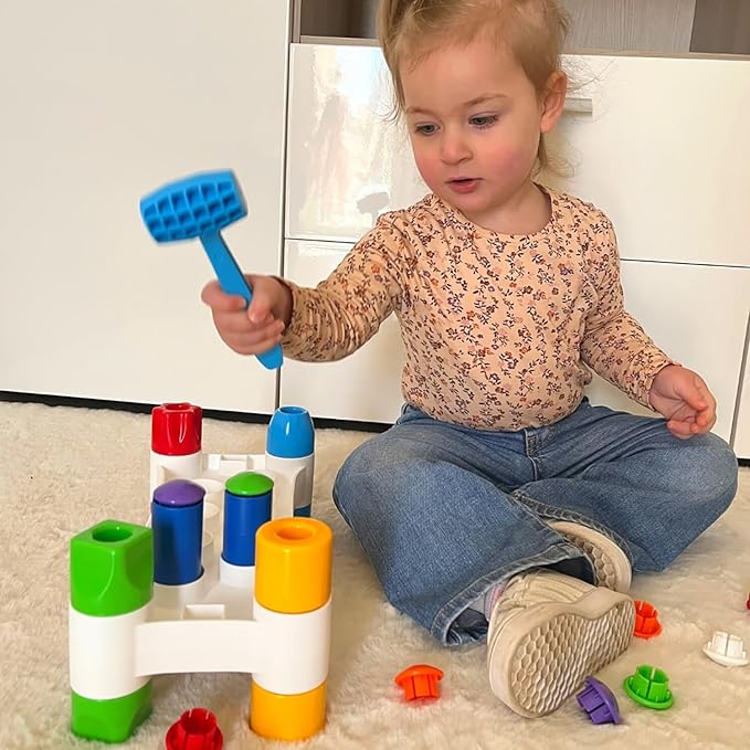 Quercetti: Hammer Peggy - Classic Peg Pounding Bench Toy, Interactive & Colorful, Raise & Lower The Sturdy Board, Cause-Effect Play, Toddler-Kid 18mo+