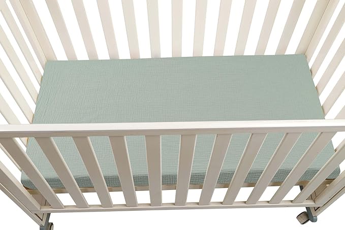 Onacosht Muslin Crib Sheets for Boys Girls, Soft Breathable 100% Cotton Baby Fitted Sheet 52" x 28" for Standard Toddler Crib Mattress, 2 Pack, Dinosaur and Light Green
