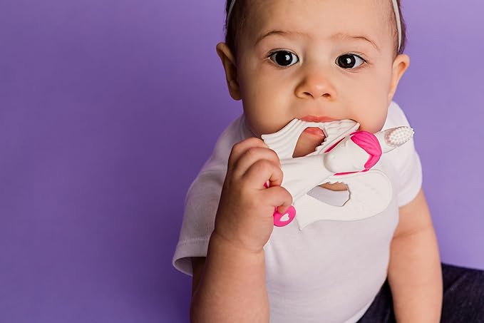 Baby Banana® Unicorn Toothbrush and Teether. Butter Soft Food Grade Bendable silcone with Feather bistles to gnaw on for All Baby Ages. Family-Owned Business.