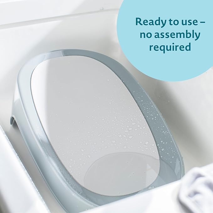 The First Years Sure Comfort Renewed Baby Bather - 50% Recycled Material Baby Bath Seat - Baby Bath Support for Infants - Newborn Bath Essentials Ages 0 to 5 Months