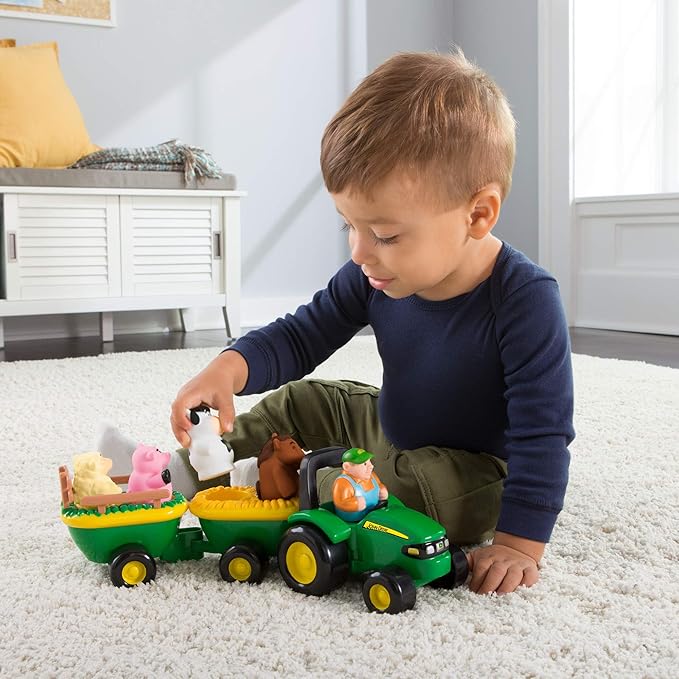TOMY John Deere Animal Sounds Hayride Musical Tractor Toy - Musical Hayride and Farm Animal Toddler Toys - Includes Farmer Figure, Tractor, and 4 Farm Animals - Ages 18 Months and Up