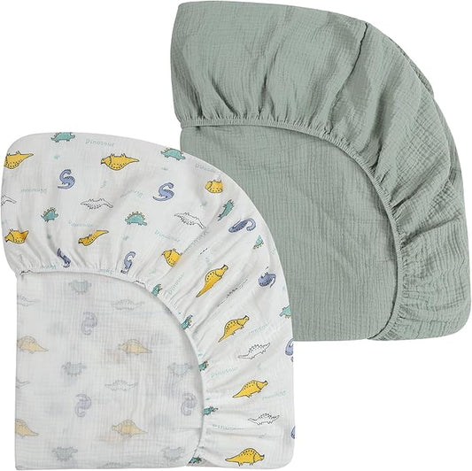 Onacosht Muslin Crib Sheets for Boys Girls, Soft Breathable 100% Cotton Baby Fitted Sheet 52" x 28" for Standard Toddler Crib Mattress, 2 Pack, Dinosaur and Light Green