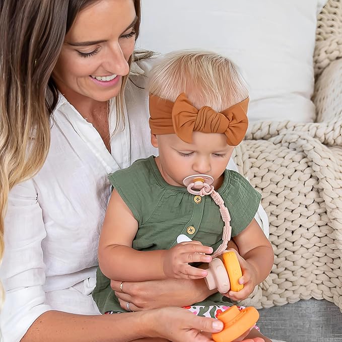 Silicone Pacifier Clip with 4 Teething Textures, One-Piece Patented Design, Dishwasher Safe, Secure Plastic Clip, Fits All Pacifiers, Baby’s Aid (Blush)
