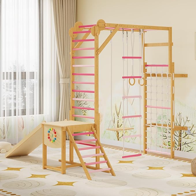 PeakPursuit 8-in-1 Indoor Jungle Gym for Kids Ages 3-10, Wooden Climbing Structure with Slide, Swing, Monkey Bars, Gymnastic Rings, Climbing Rope – Indoor Playground Toy – Natural Wood Pink