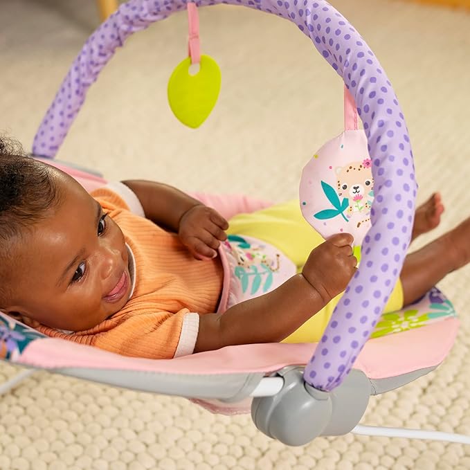 Bright Starts Pink Vibrating Baby Bouncer, Removable Toy Bar with 2 Toys, Nonslip Feet, 0-6 Months Up to 20 lbs (Wildflower Wonders)