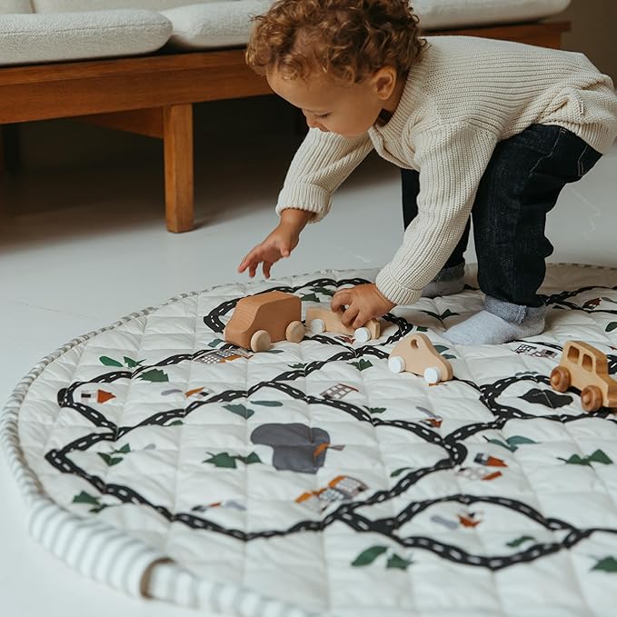 Blooom 2-in-1 Quilted Baby Play Mat & Storage Bag | Portable, Soft, and Convenient | Perfect for Travel & On-The-Go | Portable Play Mat for Baby & Toddler | Oekotex Cotton (City, 47 Inches)