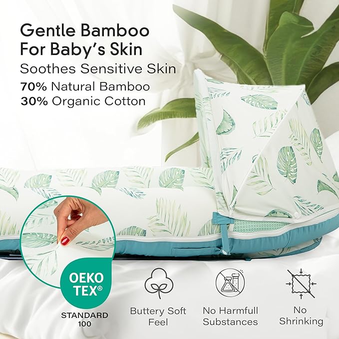 JollyBoo® Deluxe Infant Lounger Pillow - Baby Lounger 0-24 Months | Bamboo-Cotton Portable Baby Nest with Foldable Sunshade & 2 Plush Toys | Soft, Breathable Mesh for Cool, Safe Rest (Green Leaves)