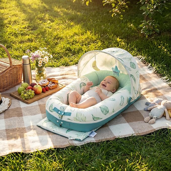 JollyBoo® Deluxe Infant Lounger Pillow - Baby Lounger 0-24 Months | Bamboo-Cotton Portable Baby Nest with Foldable Sunshade & 2 Plush Toys | Soft, Breathable Mesh for Cool, Safe Rest (Green Leaves)