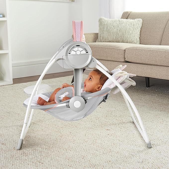 Ingenuity Comfort 2 Go Compact Portable 6-Speed Cushioned Baby Swing with Music, Folds Easy, 0-9 Months 6-20 lbs (Pink Flora the Unicorn)